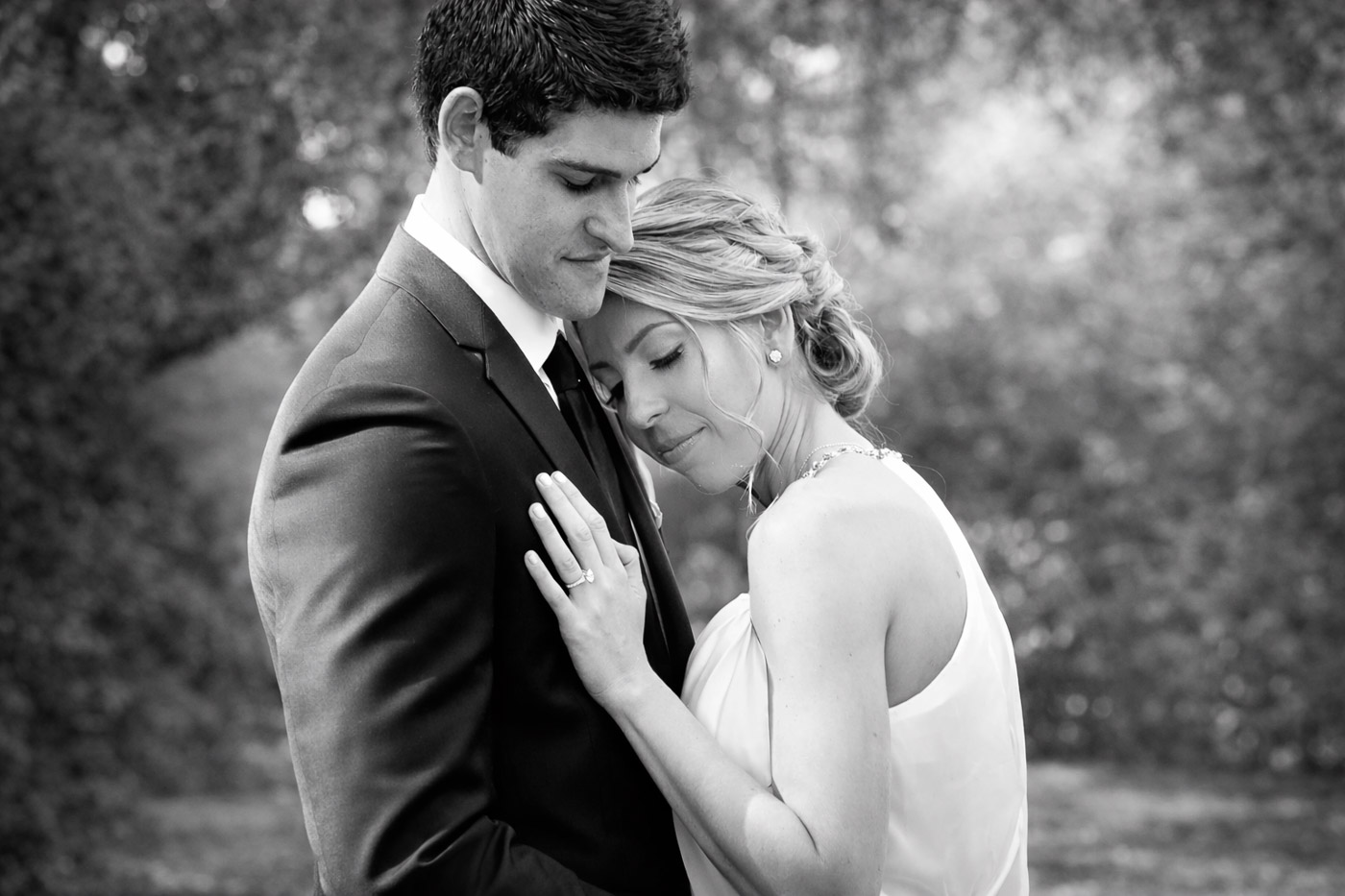 Intimate black and white bridal couple portrait