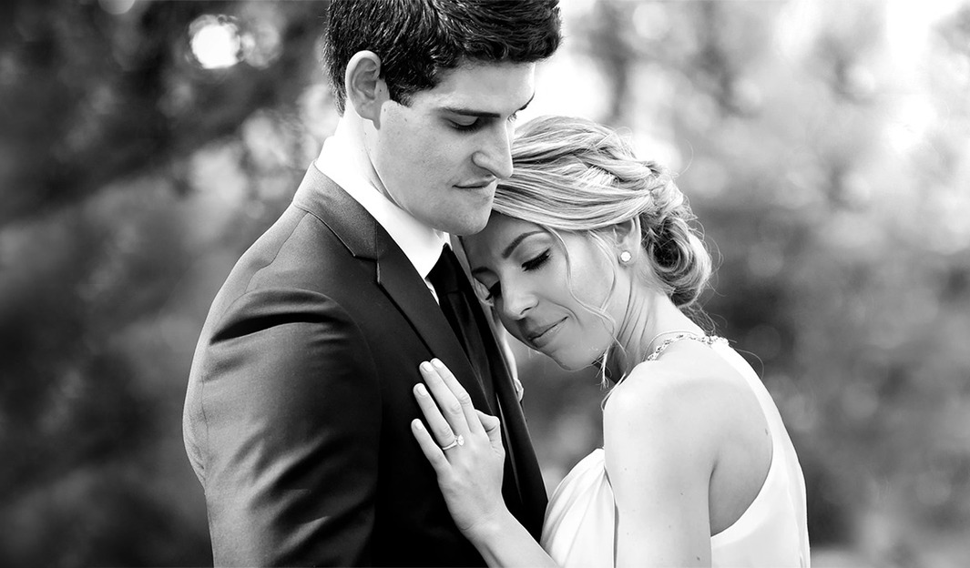 Intimate black and white bridal couple portrait